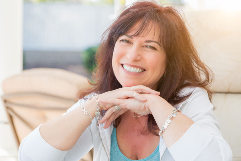 Dental Implant Patient Smiling After Her Dental Implant Procedure