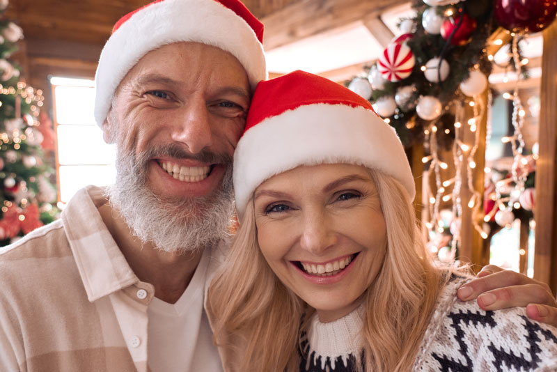 Dental Implant Patients Smiling During The Holidays